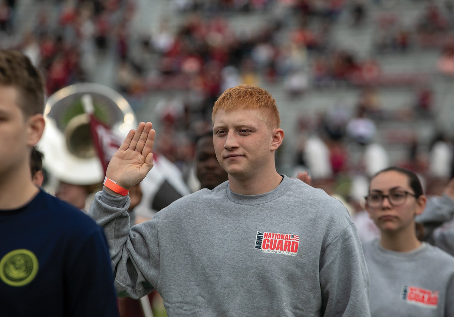 Florida Army National Guard recruits take the oath of enlistment before a football game at Florida State University’s Doak Campbell Stadium. (Credit: Florida National Guard/Sgt. Spencer Rhodes)