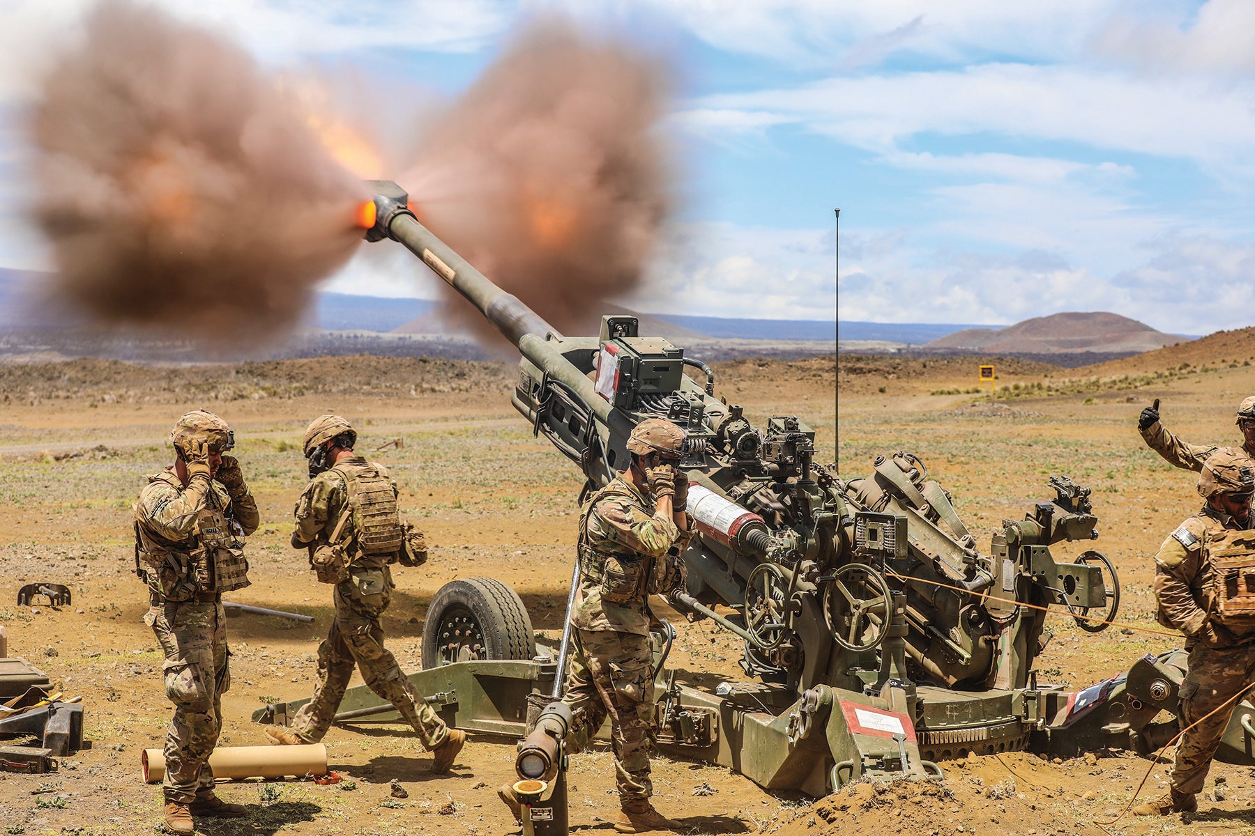 Soldiers with the 25th Infantry Division fire a howitzer during training in Hawaii. (Credit: U.S. Army/1st Lt. David Block)