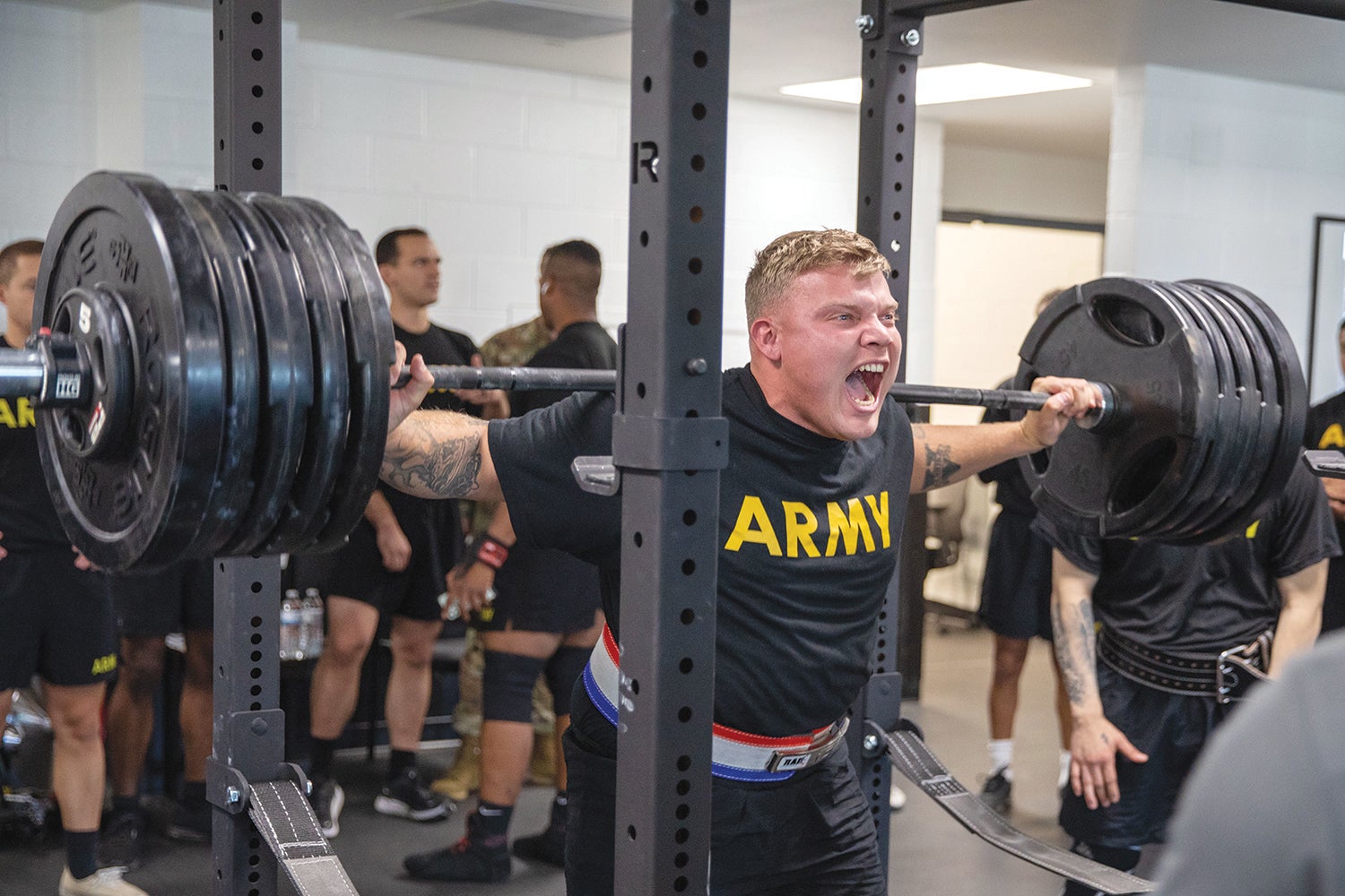 Soldiers from the 10th Mountain Division Sustainment Brigade compete in a weightlifting competition hosted by Holistic Health and Fitness trainers at Fort Drum, New York. (Credit: U.S. Army/Spc. Ethan Scofield)