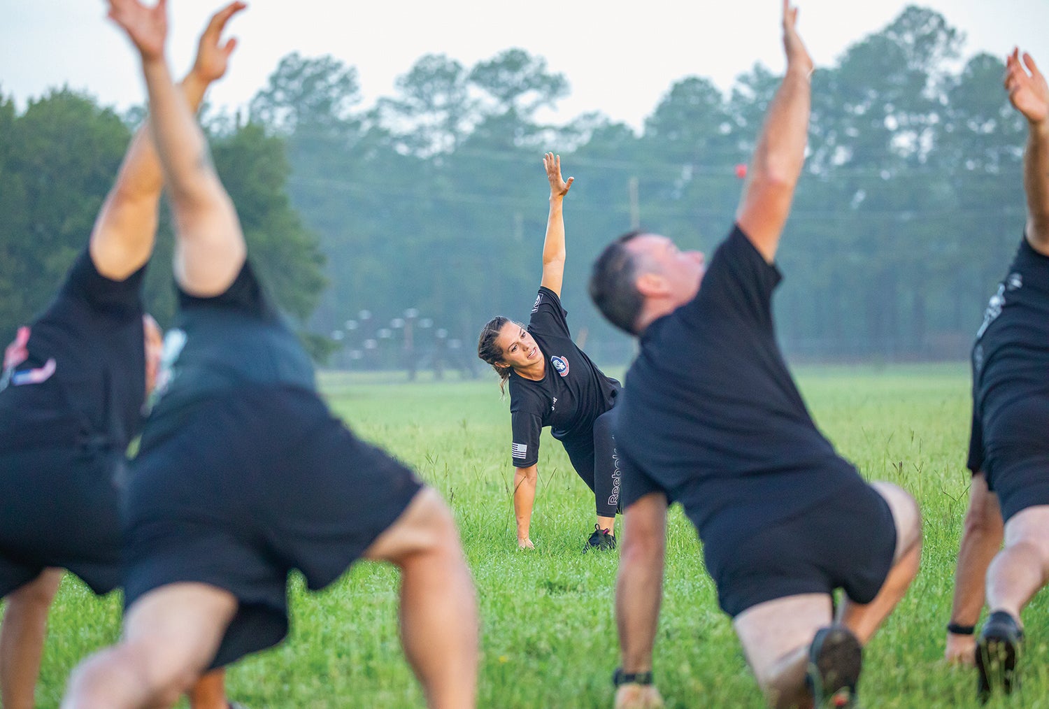 Warrant officers stationed at Fort Liberty, North Carolina, formerly known as Fort Bragg, take part in physical training led by Holistic Health and Fitness trainers. (Credit: U.S. Army/Sgt. Jacob Moir)