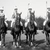 Polo-playing cavalry troops pause for a photo at Fort Myer, Virginia, circa World War I. (Credit: Library of Congress)