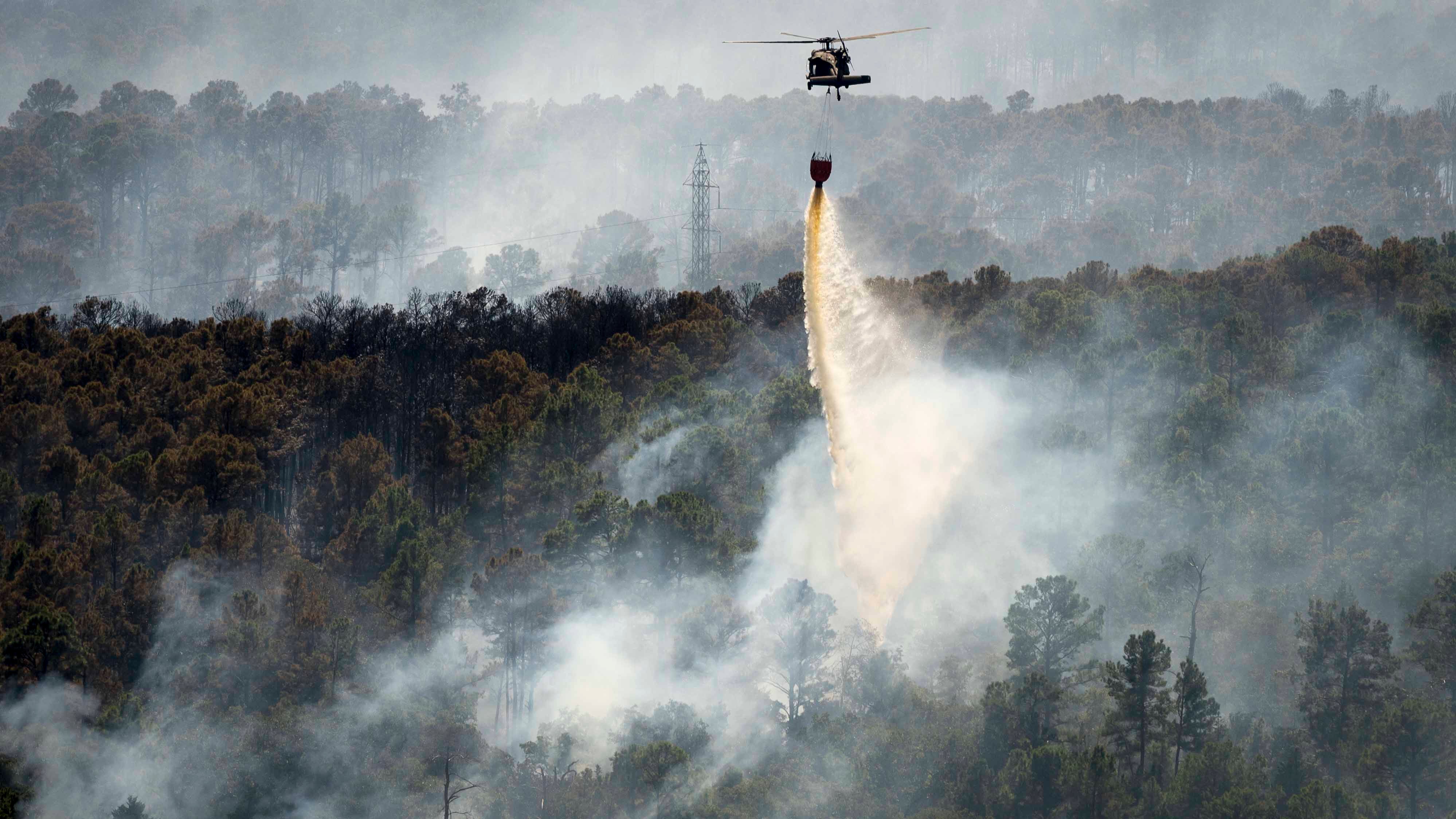 Black Hawk works to put out wildfire