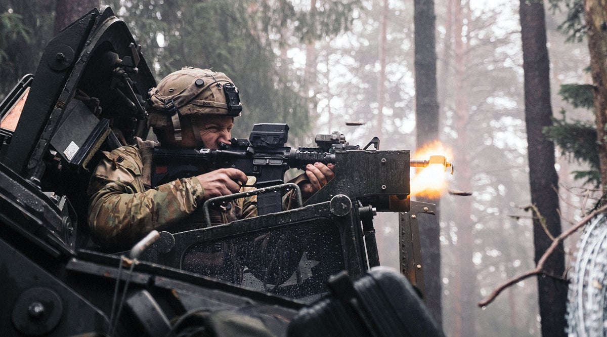 A U.S. Soldier engages the enemy during Dragoon Ready 23 at the Joint Multinational Readiness Center in Hohenfels, Germany, Feb. 1, 2023.
