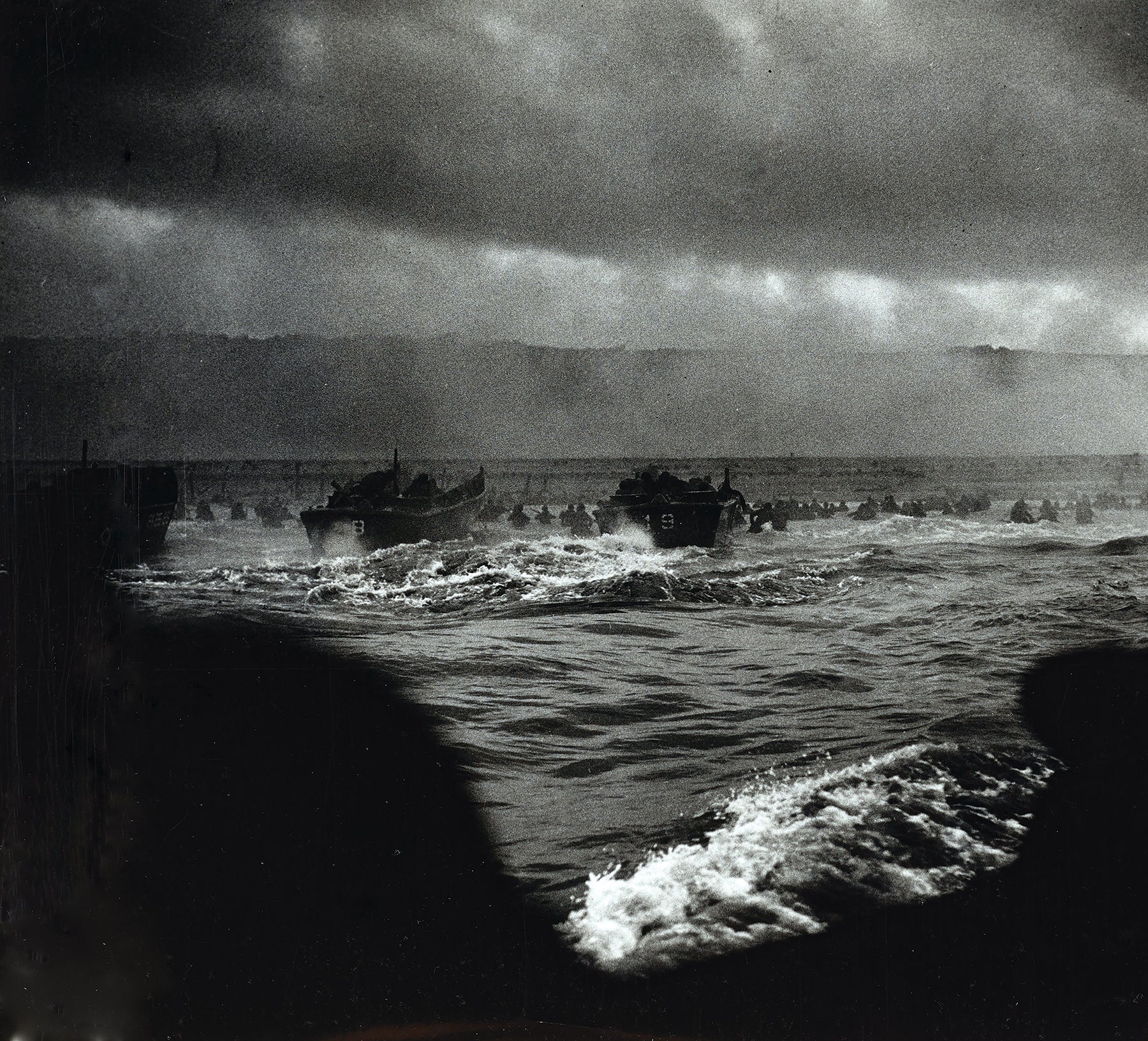 U.S. soldiers are ferried in U.S. Coast Guard vessels to the assault beaches of Normandy, France, on D-Day, June 6, 1944. (Credit: National Archives)