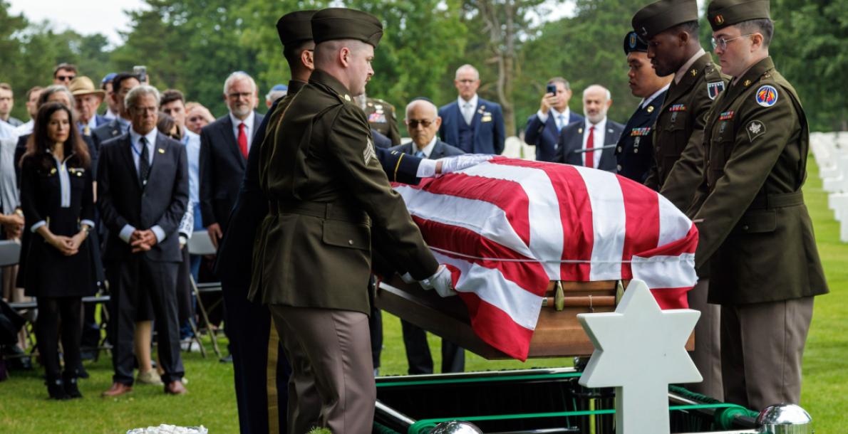 Members of the 56th Artillery Command, U.S. Army Europe and Africa, carry 1st Lt. Nathan B. Baskind’s casket at Normandy American Cemetery, France. ©Julien Nguyen-Kim/ABMC