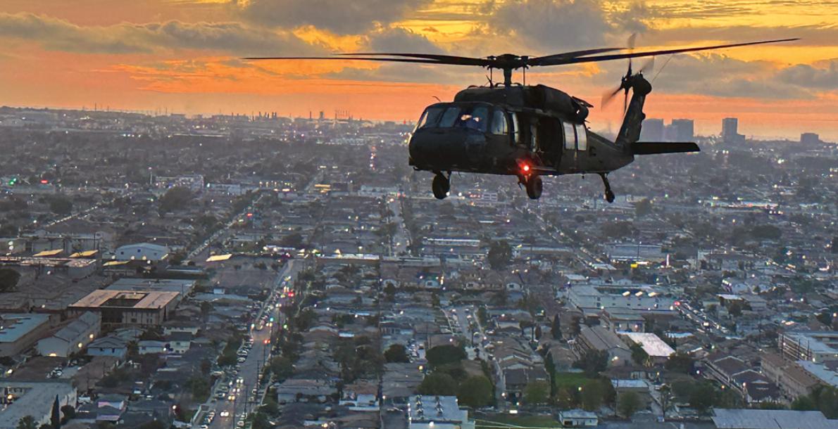 A UH-60 Black Hawk helicopter from the 2916th Aviation Battalion flies over Dignity Health Sports Park near Los Angeles to kick off an LA Galaxy soccer match. (Credit: U.S. Army/Staff Sgt. Elizabeth Bryson)