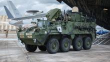 Soldiers and airmen offload Stryker combat vehicles deployed from I Corps at Joint Base Lewis-McChord, Washington, to Andersen Air Force Base, Guam, for an exercise. (Credit: U.S. Army/Spc. Jailene Bautista)