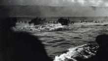 U.S. soldiers are ferried in U.S. Coast Guard vessels to the assault beaches of Normandy, France, on D-Day, June 6, 1944. (Credit: National Archives)