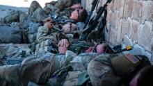 Soldiers with the Minnesota Army National Guard’s 2nd Combined Arms Battalion, 136th Infantry Regiment, rest after securing an objective at the National Training Center, Fort Irwin, California. (Credit: Minnesota National Guard/Sgt. Bill Boecker)
