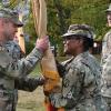 Col. Dean Roberts, left, receives the colors from Brig. Gen. Wanda Williams, commander of the U.S. Army Reserve’s 7th Mission Support Command, as he takes command of the 7th’s 510th Regional Support Group in Germany. (Credit: U.S. Army/Elisabeth Paqué)