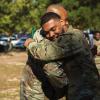 During his promotion ceremony at Fort Bragg, North Carolina, Sgt. Nathaniel Hendrix, right, hugs one of his mentors, Sgt. 1st Class Ernest Knight.During his promotion ceremony at Fort Bragg, North Carolina, Sgt. Nathaniel Hendrix, right, hugs one of his mentors, Sgt. 1st Class Ernest Knight.