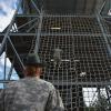 SGT Serina Glass instructs a private negotiating the “Victory Tower” during basic training at Fort Jackson, S.C.